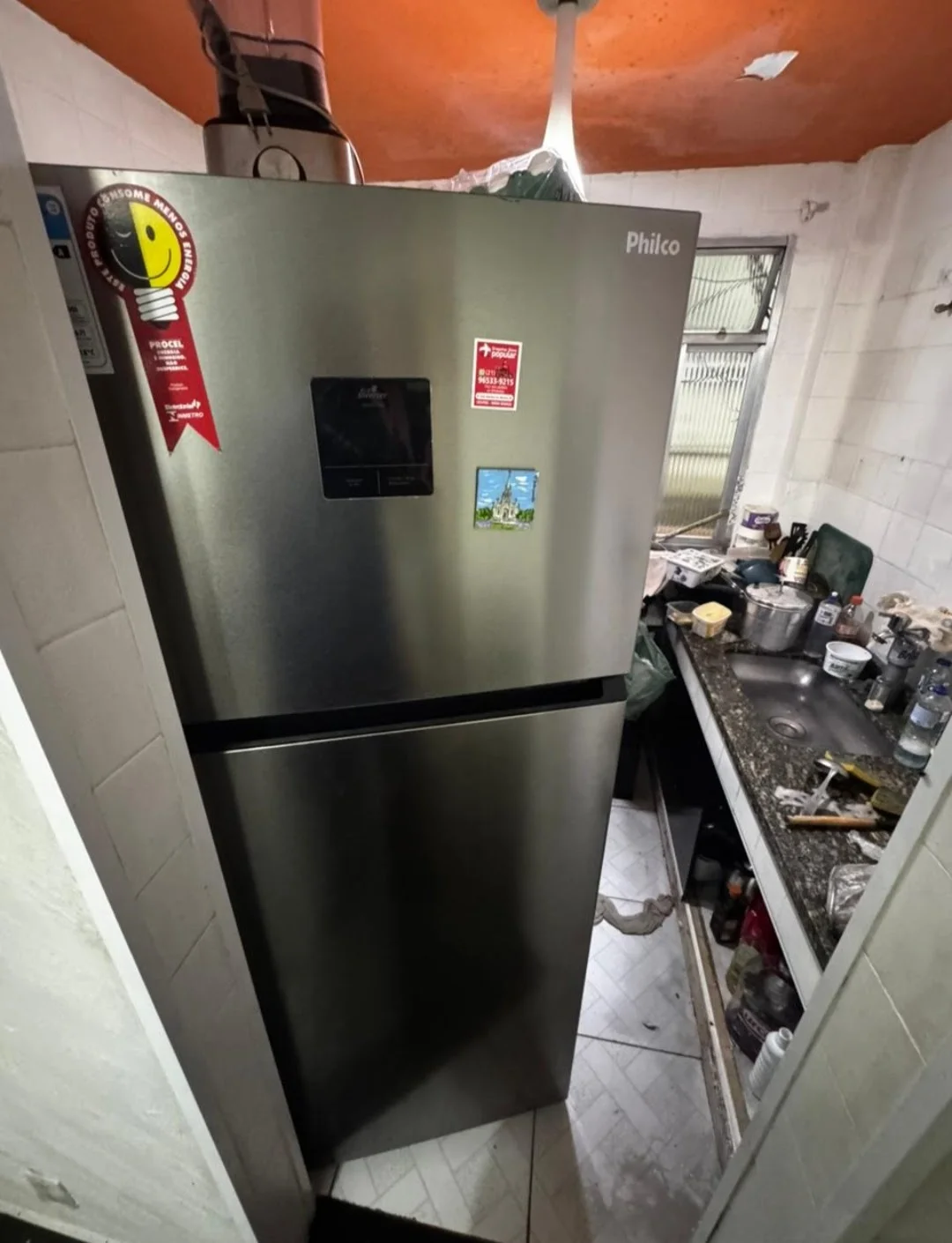 Geladeira inox com freezer superior